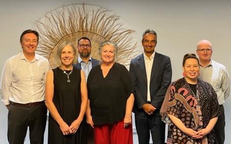 A group photo of NIAA’s independent Indigenous Evaluation Committee members Dr Fiona Cram, Tony Kiessler, Professor Michelle Dickson and Jason Ardler (Chair of the Committee) alongside senior officials from NIAA (Dr Simon Gordon and Nattlie Smith) and Treasury (Dr Shane Johnson, Head of the APS Evaluation Profession). 