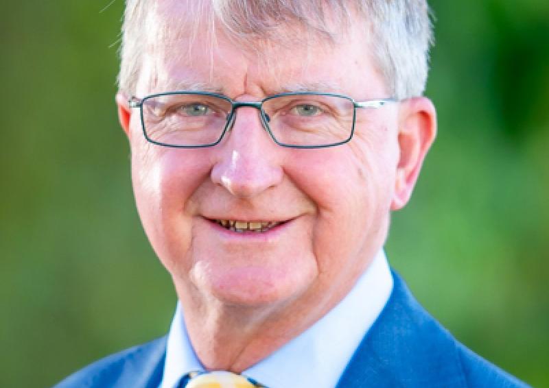 Portrait photo of Michael Manthorpe PSM wearing business attire