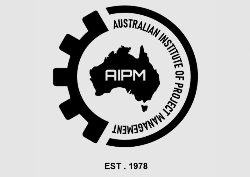 A logo for the Australian Institute of Project Management. It is a circle that is ½ a wheel cog and the other ½ a solid line with a picture of Australia in the middle with the letters AIPM. 