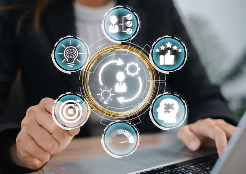 Business professional interacting with digital icons representing competence concepts, skill development, and performance.