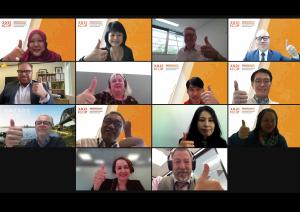 Image of screen with 14 faces in zoom ‘squares’ of attendees at a session at ICOP 2021.