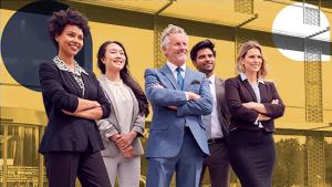 Five people standing. Three have their arms crossed.
