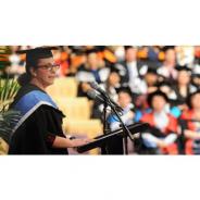 Helen Dogan giving a speech at her QUT PSMP graduation ceremony