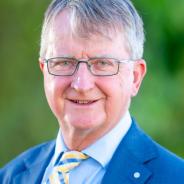 Portrait photo of Michael Manthorpe PSM wearing business attire