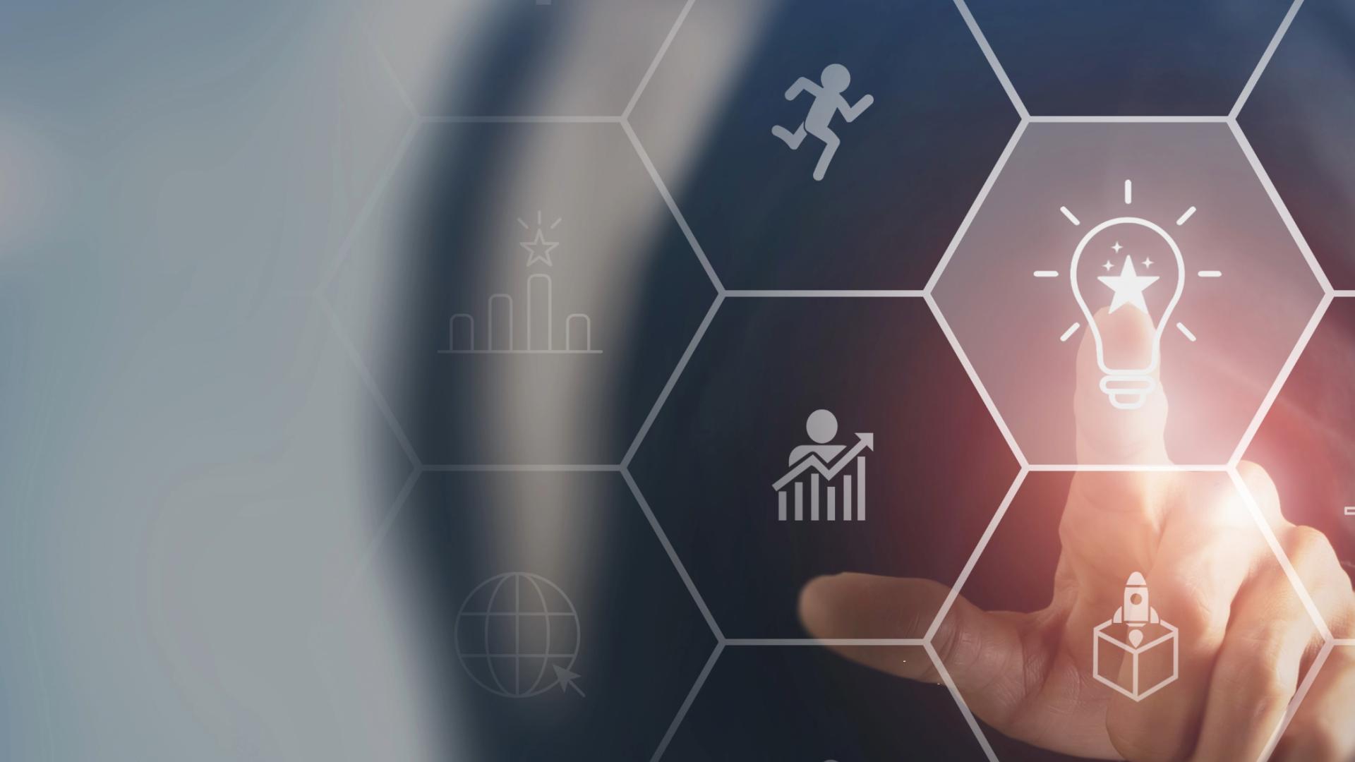 Microcredentials tile image. A person pressing a lightbulb with their finger.