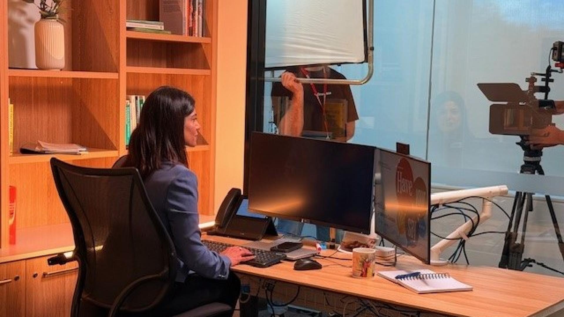 Photo of video subject taken from inside the filming studio 