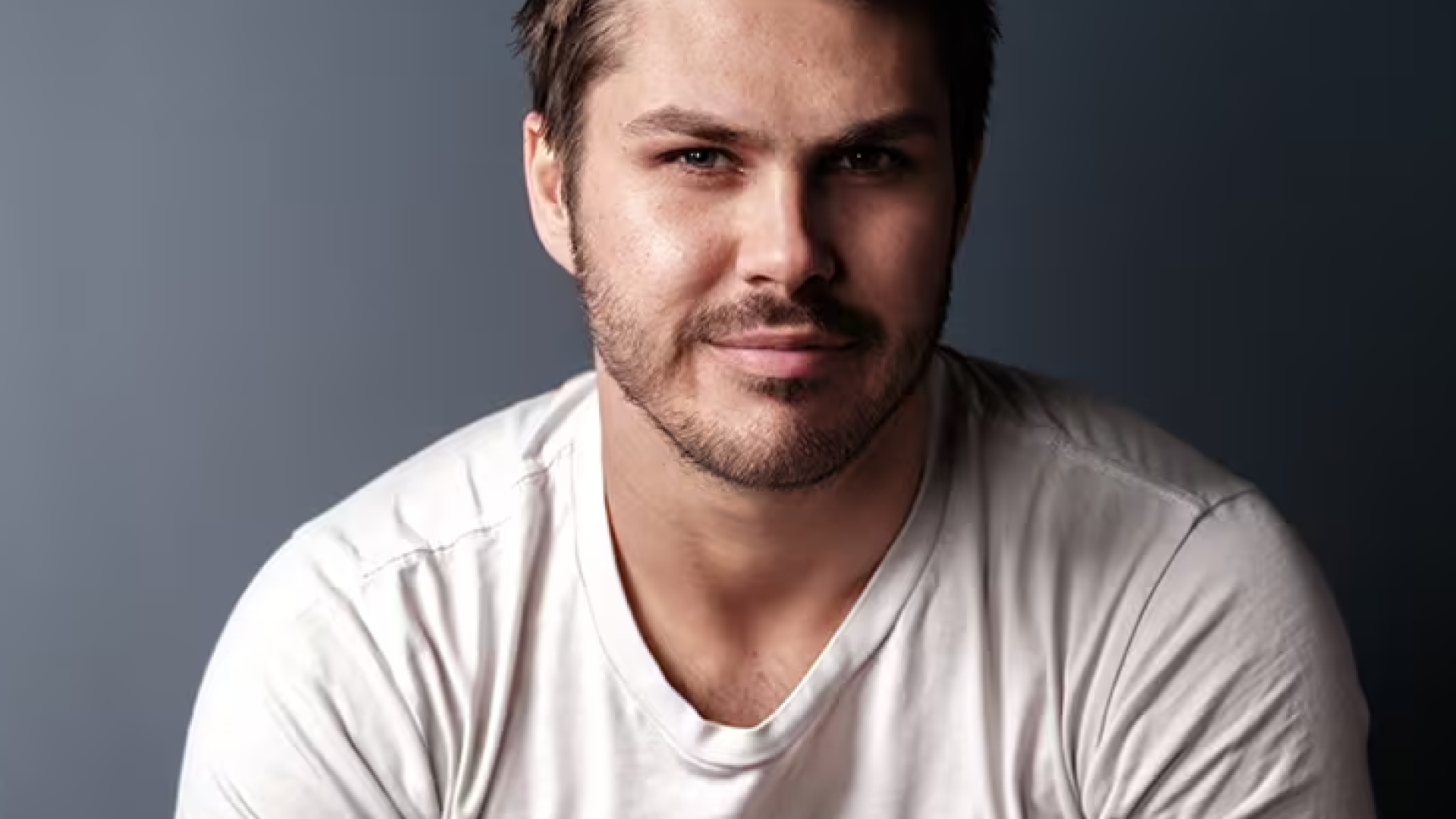 An image of Ethan Taylor looking into camera