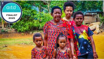 Pacific women and children smiling for photo with finalist overlay.