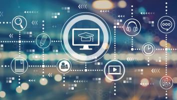 E-Learning with blurred city abstract lights background 