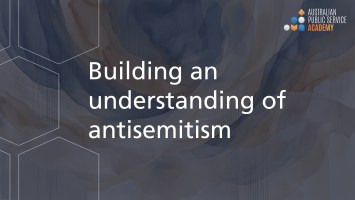 A graphic with with some shapes and a swirl of muted colours with the text "Building an understanding of antisemitism".