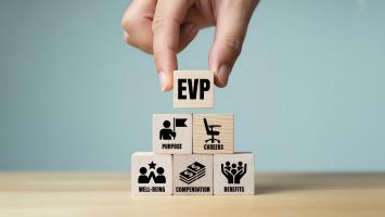 Hand placing evp block on pyramid of employee value proposition cubes